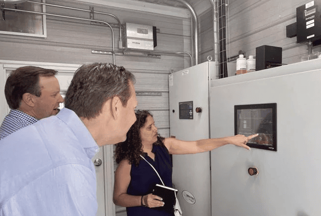 Ag-Grid Energy CEO Rashi Akki points out controls on the anaerobic digester.